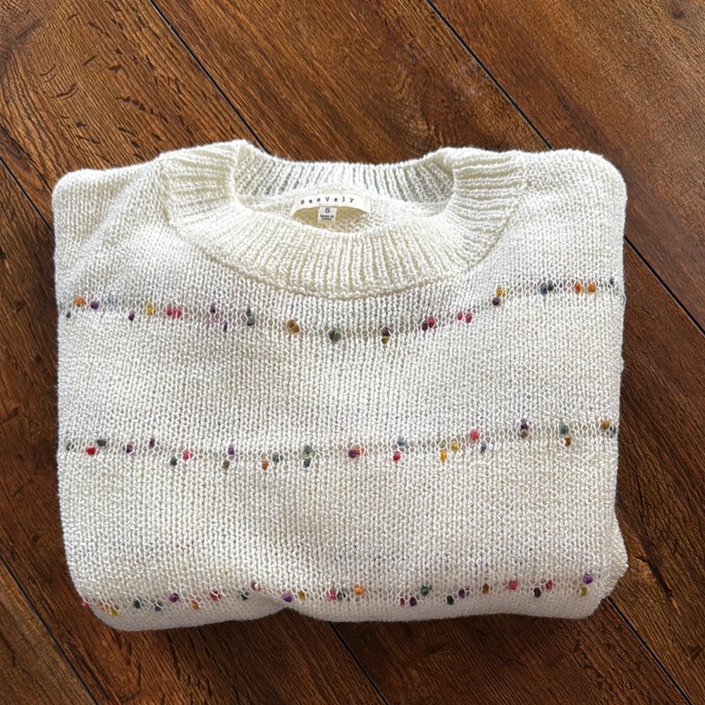 Cozy Cream Sweater with Colorful Accents